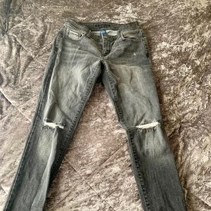 Low rise straight leg ripped black jeans